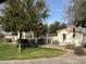 Community pool area with pergola and surrounding landscaping at 3480 E Sheffield Rd, Gilbert, AZ 85296