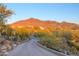 Paved driveway leading to a luxury home at 36050 N Summit Dr, Cave Creek, AZ 85331