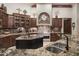 Modern kitchen features double sinks, granite countertops, and custom cabinetry at 36050 N Summit Dr, Cave Creek, AZ 85331