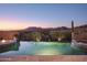 Stunning infinity pool overlooking mountains at 36050 N Summit Dr, Cave Creek, AZ 85331