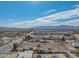 Aerial view showing a large lot with surrounding homes and distant mountains at 3616 S 67Th Ave, Phoenix, AZ 85043