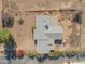 Overhead view of single-story home with backyard and surrounding landscape at 3616 S 67Th Ave, Phoenix, AZ 85043