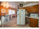 Kitchen with refrigerator, microwave, and ample cabinetry at 3616 S 67Th Ave, Phoenix, AZ 85043