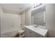 Clean bathroom with a shower/tub combo and vanity at 3810 N Maryvale Pkwy # 1060, Phoenix, AZ 85031