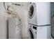 Stackable washer and dryer in a dedicated laundry room at 3810 N Maryvale Pkwy # 1060, Phoenix, AZ 85031