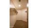 Large walk-in closet with built-in shelving at 39565 N 107Th Way, Scottsdale, AZ 85262