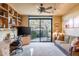 Living room with sliding doors opening to patio at 39565 N 107Th Way, Scottsdale, AZ 85262