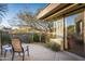 Relaxing patio with seating area and desert landscaping at 39565 N 107Th Way, Scottsdale, AZ 85262