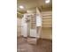 Large walk-in closet with ample shelving and drawer space at 39565 N 107Th Way, Scottsdale, AZ 85262