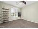 bedroom with bunk beds, built-in shelving, and window seat at 4058 E Mesquite St, Gilbert, AZ 85296