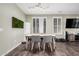 Bright dining room featuring a table with seating for four at 4058 E Mesquite St, Gilbert, AZ 85296