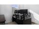 Bright home office features a large desk with ample space for multiple monitors at 4130 E Pinto Dr, Gilbert, AZ 85296