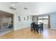 Dining area with hardwood floors and a view into the living room at 46166 W Sheridan Rd, Maricopa, AZ 85139