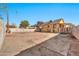 Large backyard with dirt and a partial view of house at 4626 S 8Th St, Phoenix, AZ 85040