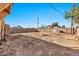 Large backyard with dirt and patchy grass at 4626 S 8Th St, Phoenix, AZ 85040