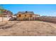 Large backyard with dirt and a view of the house at 4626 S 8Th St, Phoenix, AZ 85040