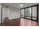 Bright bedroom with hardwood floors and city views at 4808 N 24Th St # 605, Phoenix, AZ 85016