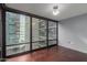 Bright bedroom with hardwood floors and city views at 4808 N 24Th St # 605, Phoenix, AZ 85016