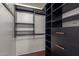 Spacious walk-in closet with ample shelving and drawers at 4808 N 24Th St # 605, Phoenix, AZ 85016