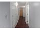 Hardwood floor hallway with light walls and doors to rooms at 4808 N 24Th St # 605, Phoenix, AZ 85016