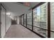 Bright hallway with large windows and carpeted floors at 4808 N 24Th St # 605, Phoenix, AZ 85016