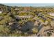 Aerial view of the property showcasing its setting and landscaping at 4836 E Moonlight Way, Paradise Valley, AZ 85253