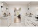 Elegant bathroom boasts double vanities, granite counters, and views to a relaxing sitting area at 4836 E Moonlight Way, Paradise Valley, AZ 85253