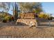 Paradise Valley Country Estates entrance sign with stone base at 4836 E Moonlight Way, Paradise Valley, AZ 85253