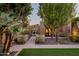 Landscaped entryway with walkway and iron gate at 4836 E Moonlight Way, Paradise Valley, AZ 85253