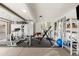 Home gym with exercise equipment in the garage at 4836 E Moonlight Way, Paradise Valley, AZ 85253