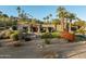 Front view of the house showcasing its architecture and landscaping at 4836 E Moonlight Way, Paradise Valley, AZ 85253