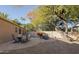 Relaxing patio with brick paving and seating area at 4836 E Moonlight Way, Paradise Valley, AZ 85253