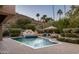 Relaxing pool area with spa and lounge chairs at 4836 E Moonlight Way, Paradise Valley, AZ 85253