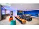 Fun game room with pool table, bar, and comfortable seating at 4949 E Red Rock Dr, Phoenix, AZ 85018