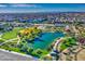 Aerial view of community park with pool, pond, and basketball court at 5015 S Quantum Way, Mesa, AZ 85212