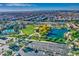 Aerial view of community park with pool, pond, and basketball court at 5015 S Quantum Way, Mesa, AZ 85212