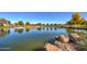 Peaceful lake with surrounding landscape at 5015 S Quantum Way, Mesa, AZ 85212