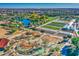 Large community park with playground, gardens, and a pond at 5015 S Quantum Way, Mesa, AZ 85212