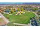 Large community park with shade structures and pond at 5015 S Quantum Way, Mesa, AZ 85212