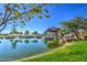 Scenic pond with gazebo and lush landscaping at 5015 S Quantum Way, Mesa, AZ 85212