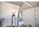 Garage with water heater and water softener at 5015 S Quantum Way, Mesa, AZ 85212