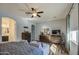 Main bedroom with wood floors and plenty of sunlight at 5015 S Quantum Way, Mesa, AZ 85212