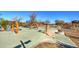 Modern playground with slides and climbing features at 5015 S Quantum Way, Mesa, AZ 85212