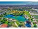 Scenic pond with walking paths, gazebo, and lush landscaping at 5015 S Quantum Way, Mesa, AZ 85212