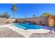 Enjoy this private backyard with a sparkling pool and desert plants at 5015 S Quantum Way, Mesa, AZ 85212