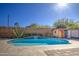 Enjoy this beautiful pool area with a water feature and desert landscaping at 5015 S Quantum Way, Mesa, AZ 85212