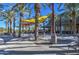 Outdoor water feature with shade sails, palm trees and seating at 5015 S Quantum Way, Mesa, AZ 85212