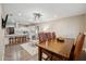 Spacious dining area with a large wooden table and leather chairs at 5028 N Scottsdale Rd, Paradise Valley, AZ 85253