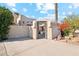 Unique entrance with decorative gate and courtyard at 5028 N Scottsdale Rd, Paradise Valley, AZ 85253