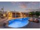 Expansive backyard oasis featuring a sparkling pool and spacious patio at 5028 N Scottsdale Rd, Paradise Valley, AZ 85253